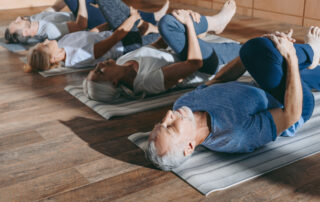 Group of seniors enjoying yoga at Reserve at Red Run