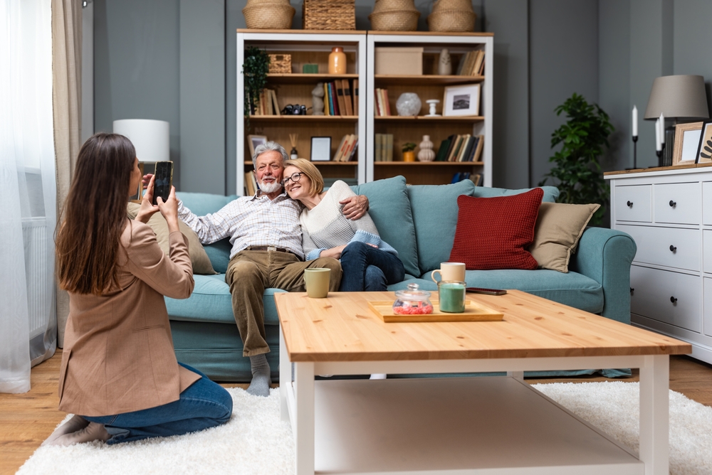 Senior couple posing for photo in independent living in Royal Oak.